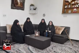 دیدار مسئول بسیج جامعه زنان اسدآباد با خانواده شهدا