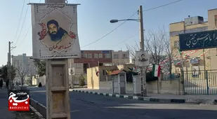 &nbsp;محله حسنیه پردیسان قم به تصاویر شهدا مزین شد