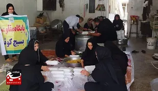پخت و توزیع غذای گرم نذری محرم درروستای ناصرآباد هندیجان