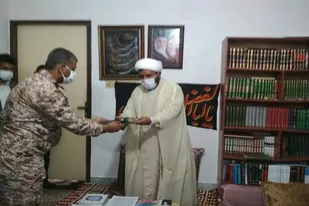 تجلیل از امام جمعه و استادیار صالحین شهرستان دلگان