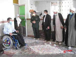 دیدار مسئولین جوانرود با خانواده جانباز 70درصد