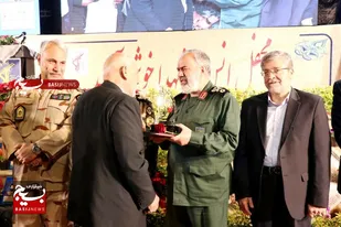 از خانواده شهدای یگان حفاظت سپاه فرودگاه مشهد تجلیل شد + عکس