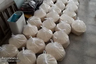 توزیع ۱۰۰بسته معیشتی به همت بسیجیان ملایر