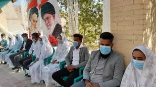 برگزاری جشن ازدواج آسان ۱۱ زوج جوان در جوار قبور مطهر شهدای دوساری شهرستان عنبرآباد