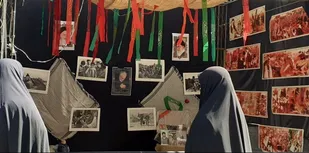 برپایی نمایشگاه کتاب و پوستر نقش زنان در دفاع مقدس