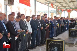 آئین غبار روبی مزار مطهر شهدا در شهرستان باغملک برگزار شد
