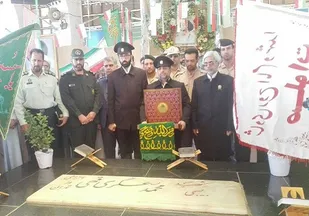 حضور خادمین حرم رضوی در یادمان شهدای پاوه