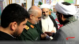 نشان حرم آقا علی بن موسی الرضا(ع) بر سینه فرمانده گیلانی