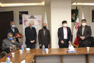تجلیل از خانواده شهدای مدافع حرم در فدراسیون کشتی