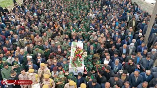 پیکر بسیجی شهید &laquo;داوود جاودانیان&raquo; در زادگاهش آرام گرفت +( تصاویر(
)