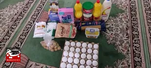 تهیه و توزیع بسته های کمک معیشتی در بین نیازمندان شهرستان محمودآباد
