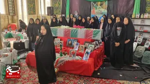 آیین تکریم مادران و همسران شهدای شهر هرند