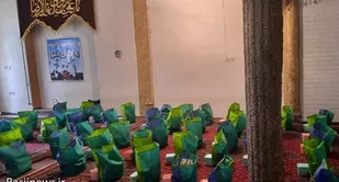 توزیع بسته های معیشتی توسط بسیج خواهران کرمانشاه