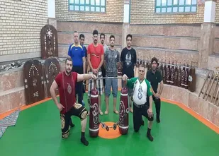 تجلیل از ورزشکار قهرمان رسول محمدی جانباز 60 درصد