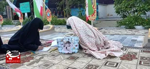 گزارش تصویری دست کودکان دهه&zwnj;نودی در دستان شهدا/بیعت کودکان با شهدا