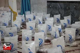 توزیع بسته&zwnj;های معیشتی و لوازم&zwnj;التحریر، در راستای اجلاسیه ۴۳۲ شهید شهرستان ساوجبلاغ