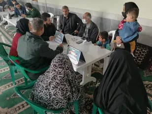 برپایی میز خدمت در محله کم برخوردار لاملنگ گرگان