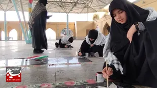رنگ آمیزی قبور شهدا به دست دختران نخل ها