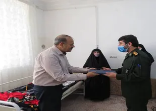 دیدار فرمانده سپاه ناحیه ایلام با خانواده  شهید شاخص بسیج فرهنگیان کشور