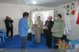 تجلیل از مدافعان سلامت بسیجی در فامنین