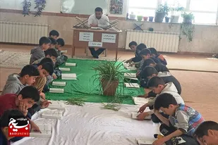 جزء خوانی قرآن کریم توسط دانش آموزان مدرسه شهید امیدی عابد روستای بابانظر
