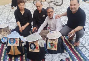 توزیع کلاه و آفتاب&zwnj;گیر مُزیّن به  &laquo;ابناءالحسین&raquo; بین زائران اربعین حسینی