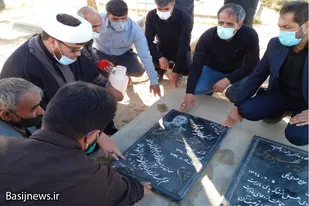 آیین غبارروبی و تعویض پرچم&zwnj;های گلزار شهدای روستای امزاجرد