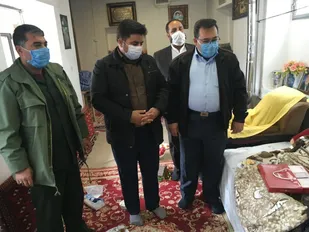 دیدار مسئولان بخش بیارجمند شاهرود با خانواده شهید عامری