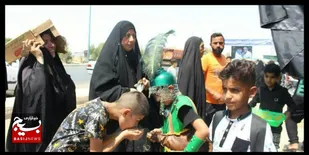 مشق خادمی دانش آموزان شوش در عزای خاتم النبیین