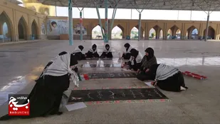 دلنوشته یکی از دختران رنگ آمیز هنگام نوسازی قبور شهدای گمنام خرمشهر