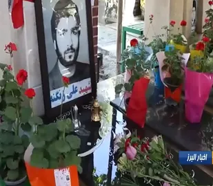 تجدید پیمان دانش آموزان دبستان شهید زنگنه با معلم شهید علی زنگنه
