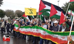 راهپیمایی حمایت از زنان و کودکان مظلوم غزه در هوای بارانی  اهواز