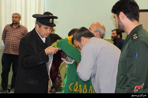 پرچم حرم حضرت علی ابن موسی الرضا در حسینیه سپاه استان البرز