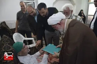 دیدار مسؤولان شاهرودی با خانواده شهدای سادات+ عکس