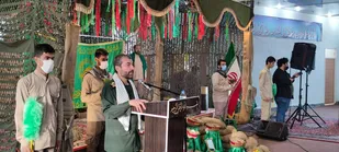 مراسم اهتزاز پرچم گنبد حرم مطهر رضوی در یادمان ثامن الائمه علیه السلام