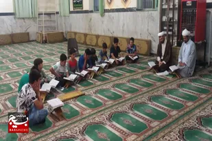 تجلیل مسئول نمایندگی ولی فقیه در سپاه رزن از بسیجیان روستای سورتجین