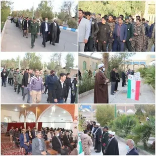 به مناسبت هفته بسیج ادای احترام مسئولین ادارات و بسیجیان شهرستان راور به شهدا در محل گلزار شهدا