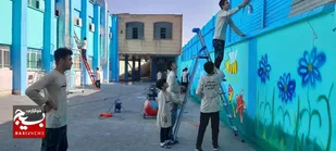 رنگ جهاد و امید بر دیوارهای مدارس قم