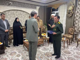 تجلیل مسئولان راه و شهرسازی و بسیج ادارات از خانواده شهیدان پیشوا و مرادی