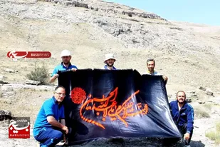اهتزاز پرچم عزای امام حسین(ع) بر فرار بلندترین نقطه ماکو