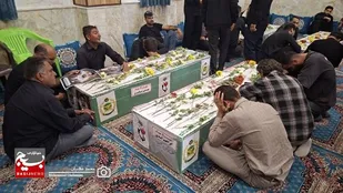 وداع با پیکر ۹ شهید پدافند سیراف در کنگان