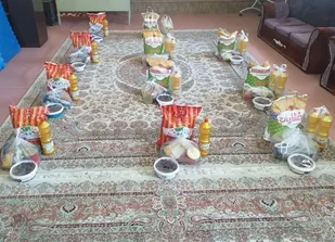 تهیه وتوزیع بسته های معیشتی و کمک مؤمنانه به مناسبت عید فطر