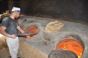تهیه و توزیع ۳۰۰ بسته نان خشک در سطح شهرستان اشکذر