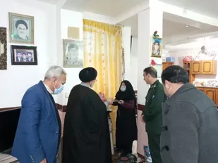 تجلیل از مادران و همسران شهدا در دهلران