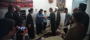 دیدار با خانواده شهید کارگر در دهلران