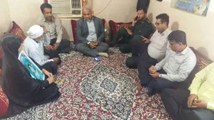 از خانواده شهید نکویی در بخش سندرک میناب تجلیل شد