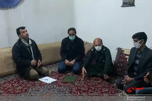دیدار فرمانده حوزه بسیج بنجار با خانواده شهید