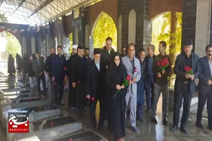عطر افشانی مزار شهدای شهر برزول به مناسبت هفته بسیج