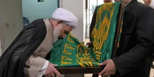 حرکت پرچم حرم رضوی پیام&zwnj;آور رأفت است