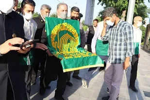 برگزاری آئین استقبال از پرچم متبرک و خادمان حرم مطهر رضوی+تصاویر